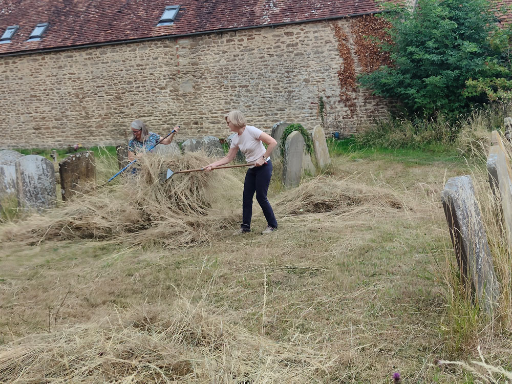 raking the churchyard
