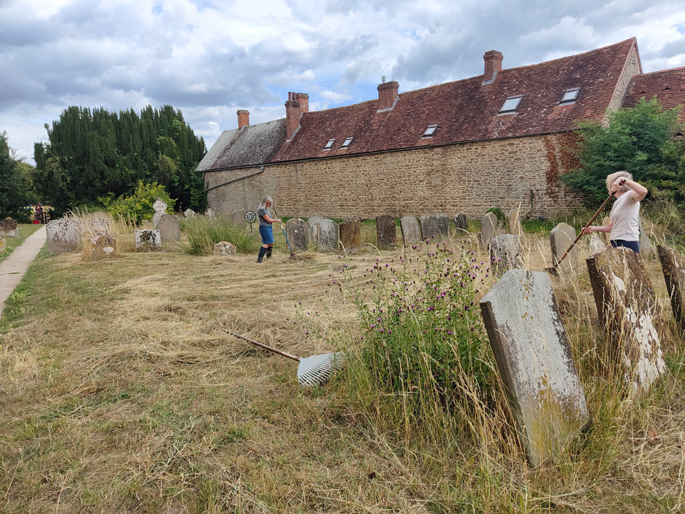 raking the churchyard